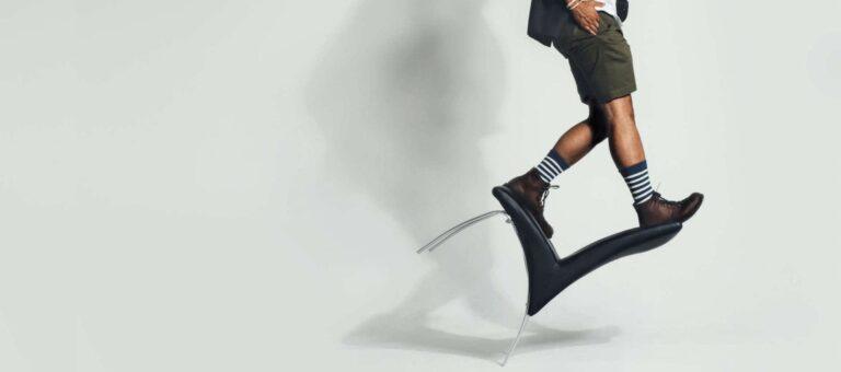 Man walking on a chair