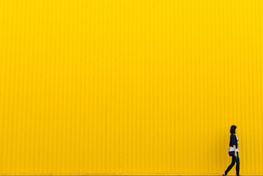 Yellow Building with Woman