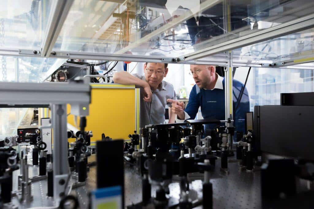Two men analyzing experiment