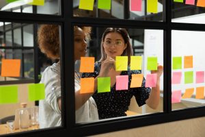 two women in front of Kanban